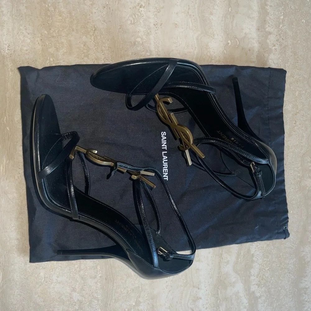 Saint Laurent Black Leather Logo T-Strap Stiletto Sandals with Gold YSL Logo - Picture 4 of 9